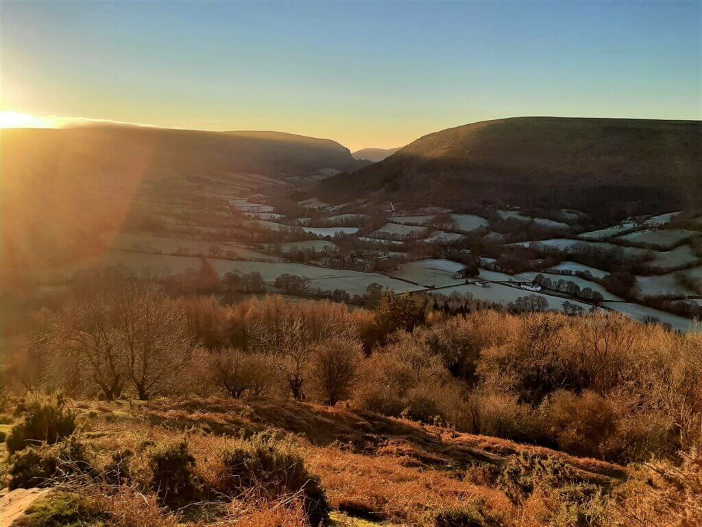 view of llanthony priory from hatterrall ridge
