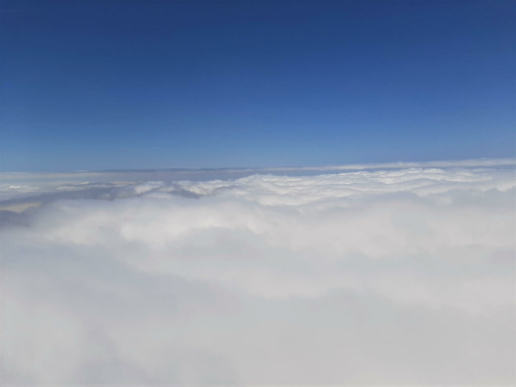 looking down on a cloud layer