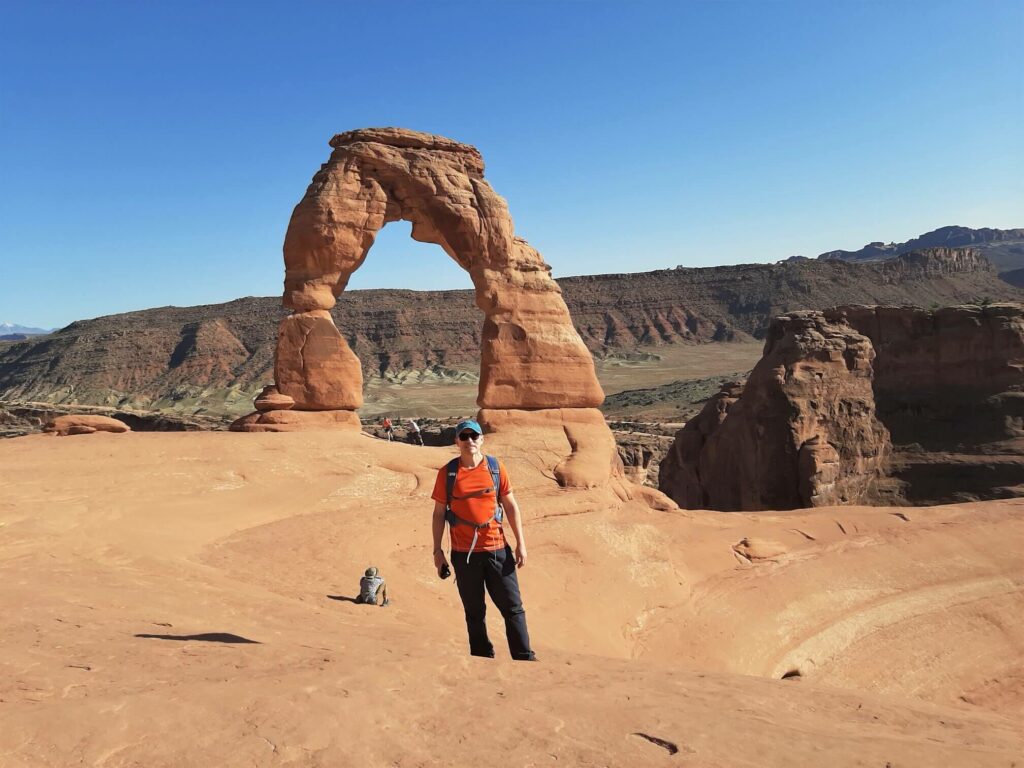gavin in front of delicate arch