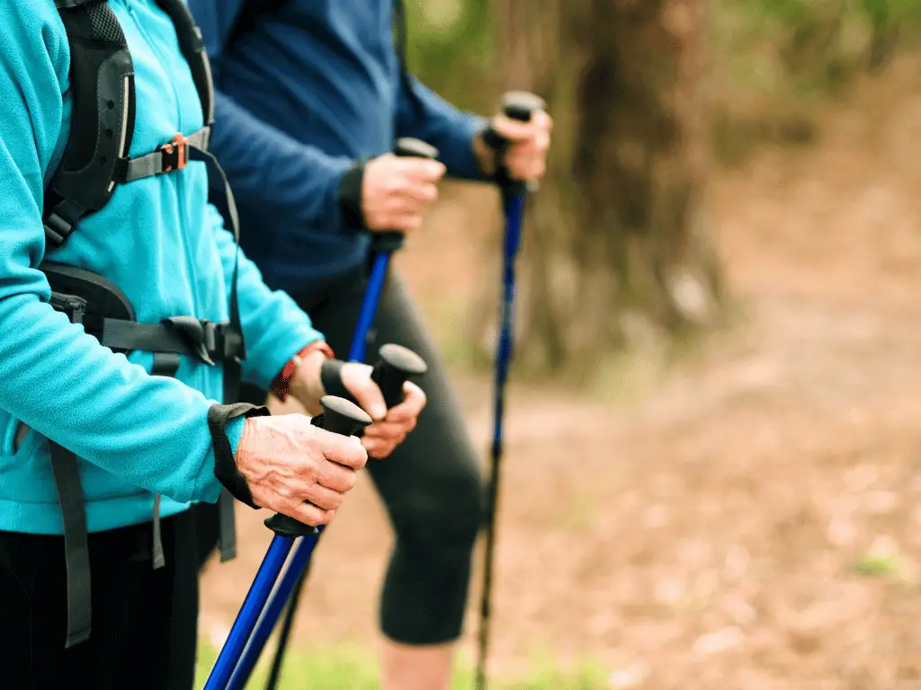 use trekking poles to aid stability when hiking